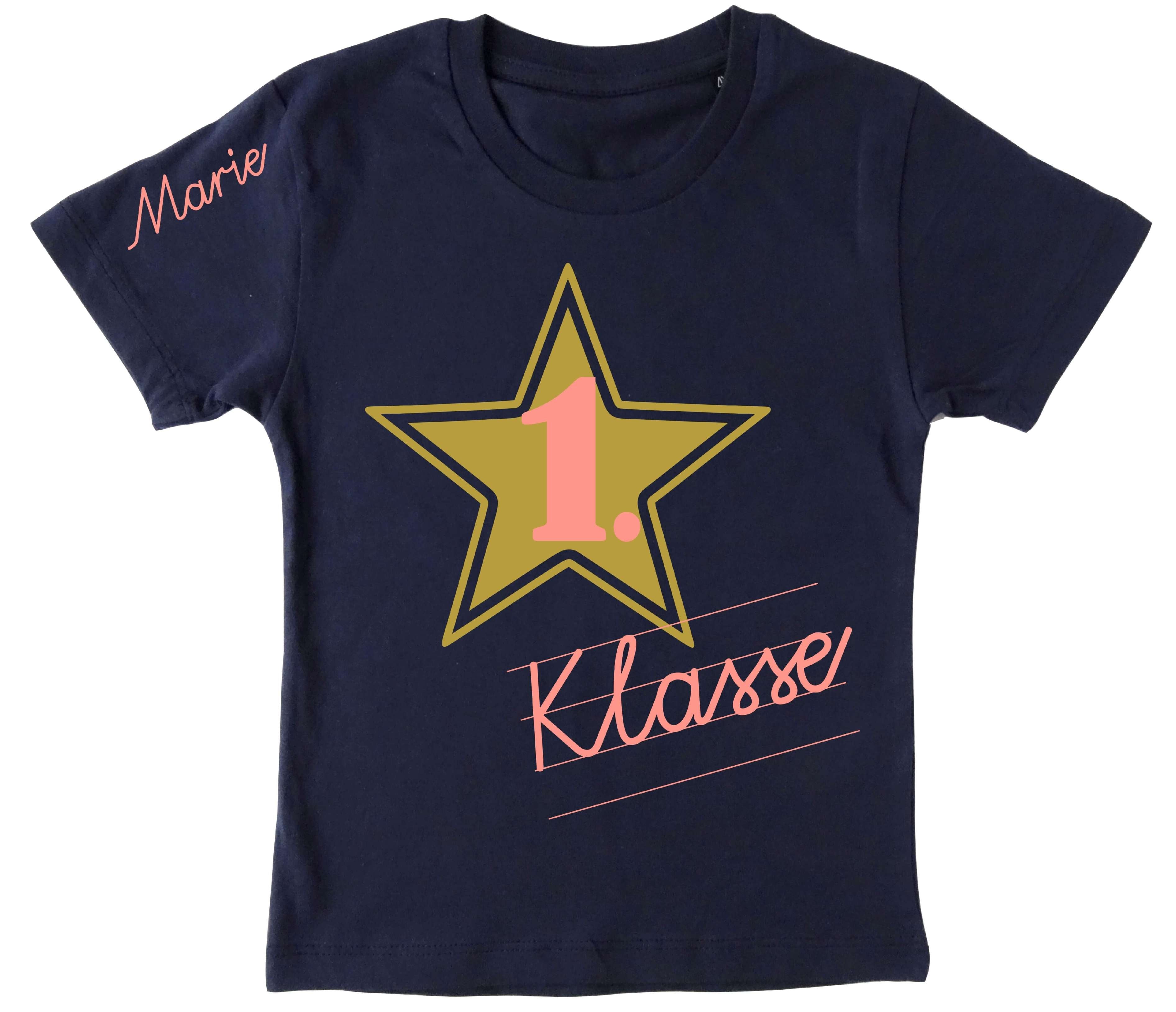 navi T-Shirt für Einschulung, bedruckt mit Schreibschrift 1. Klasse und Name in rosa und goldenem Stern