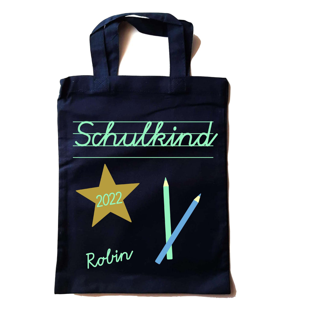 kleine navi farbene Tasche in Apotheker-Größe bedruckt mit Schulkind in Schreibschrift und Name in mint