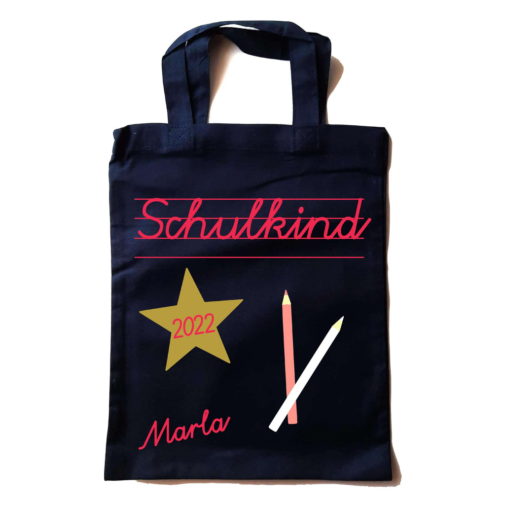 kleine navi farbene Tasche in Apotheker-Größe bedruckt mit Schulkind in Schreibschrift und Name in pink