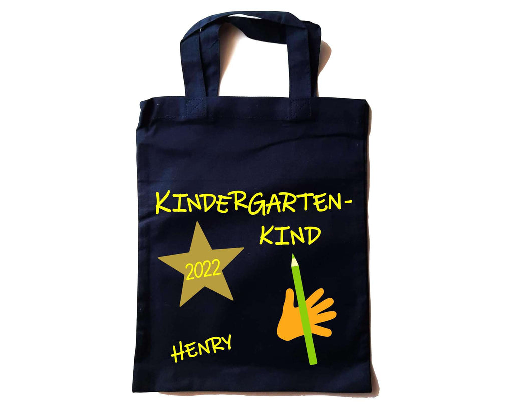 kleine navi farbene Tasche in Apotheker-Größe bedruckt mit Kindergartenkind und Name in gelb für KITA-Anfang 