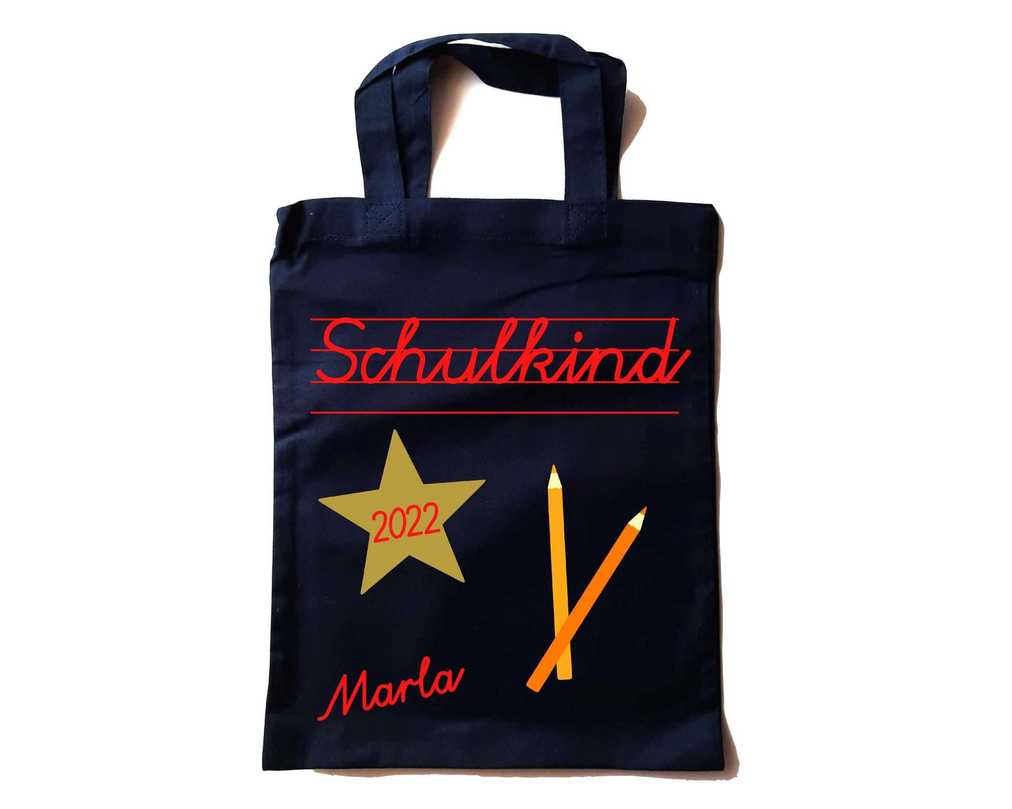 kleine navy farbene Tasche in Apotheker-Größe bedruckt mit Schulkind in Schreibschrift und Name in rot
