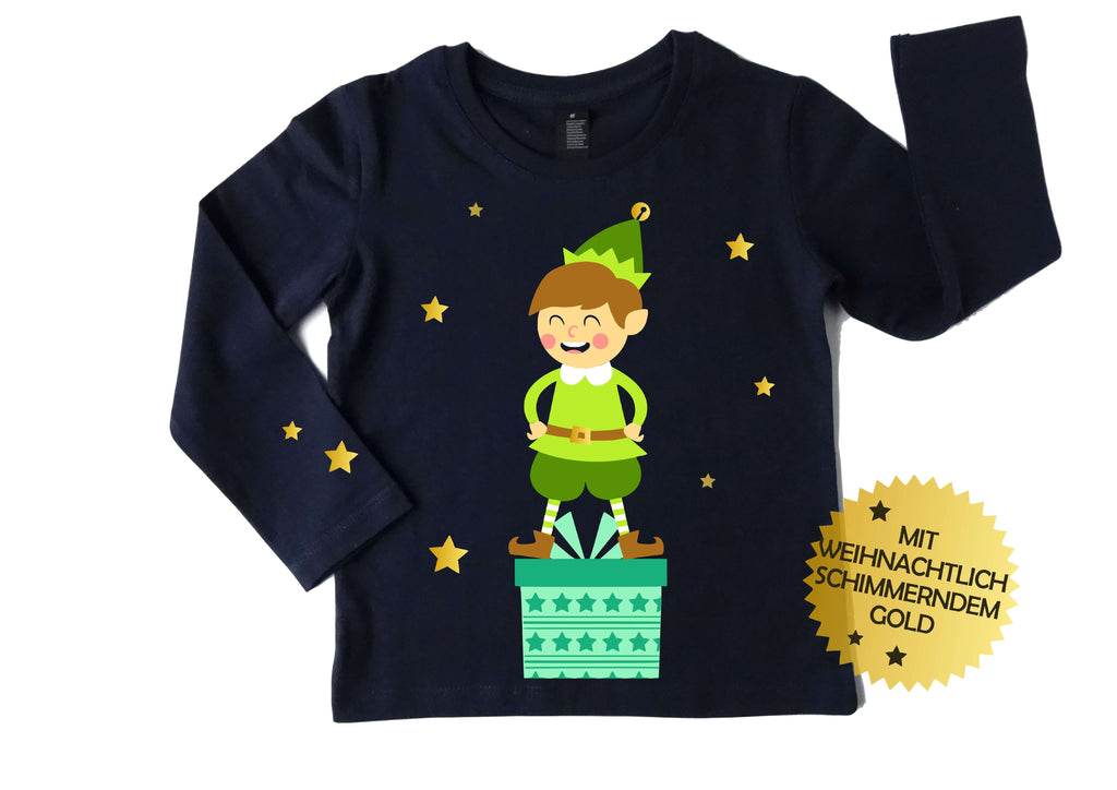 navi Langarmshirt für Kinder mit Name und Zahl und großem Weihnachtswichtel auf mint farbenem Geschenk stehend